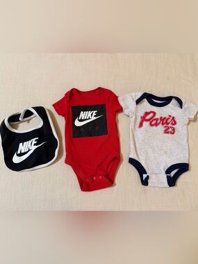 2 Nike Jordan onesies with Logo & Nike bib